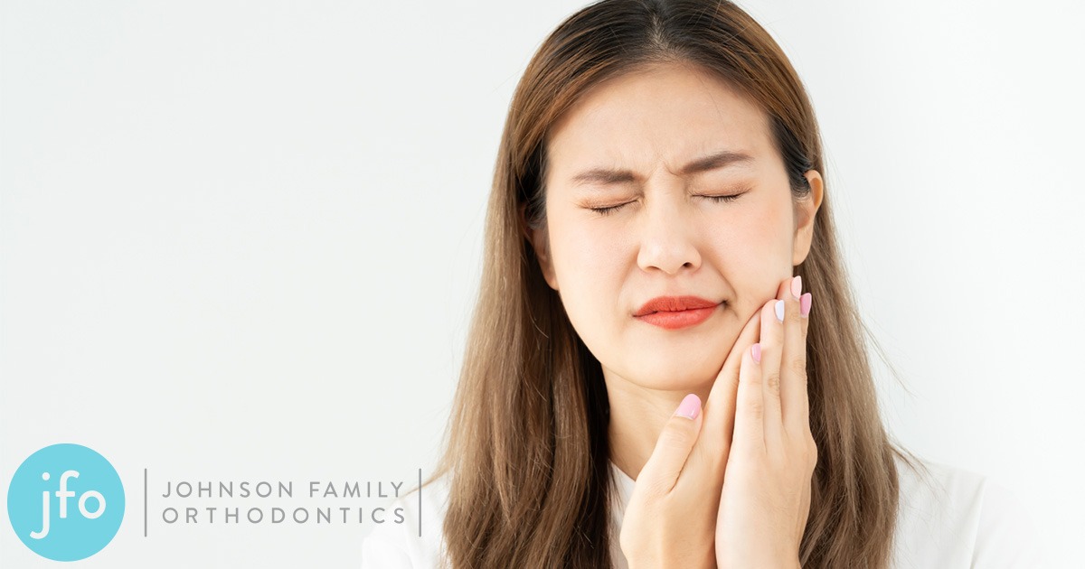 Woman with pain in mouth due to braces salem