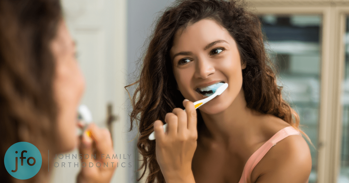 Girl brushing teeth