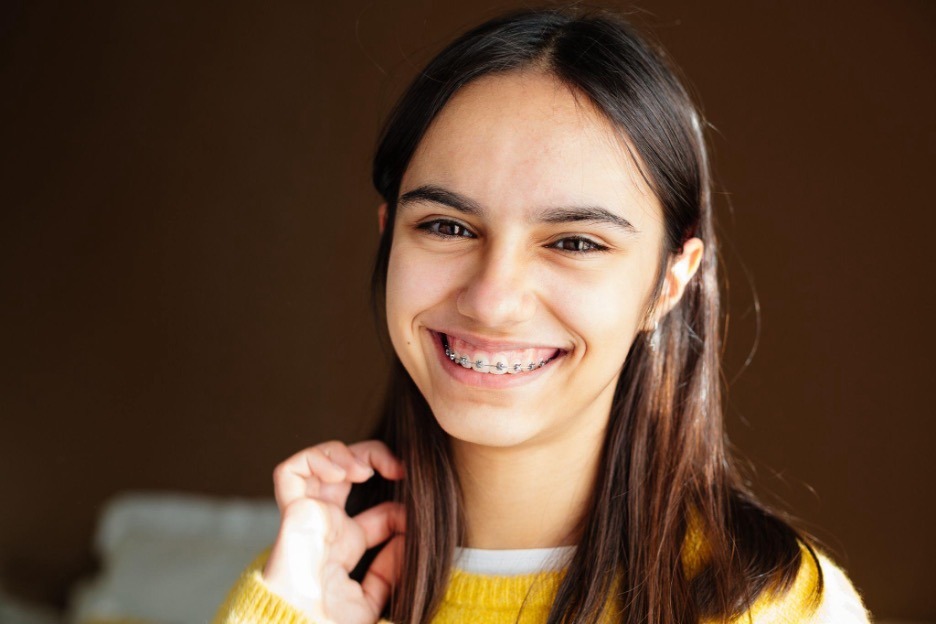 Girl smiling with braces